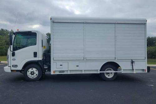 Hackney - IN STOCK - 2023 ISUZU NPRHD HACKNEY 6-BAY SIDELOAD